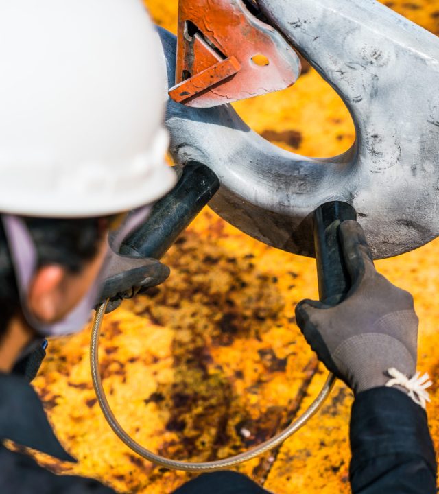 check for cracks in crane hooks by permanent magnet method magnetic particle test.