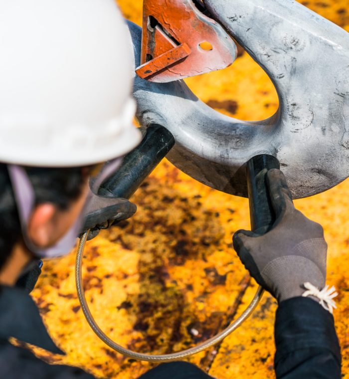 check for cracks in crane hooks by permanent magnet method magnetic particle test.